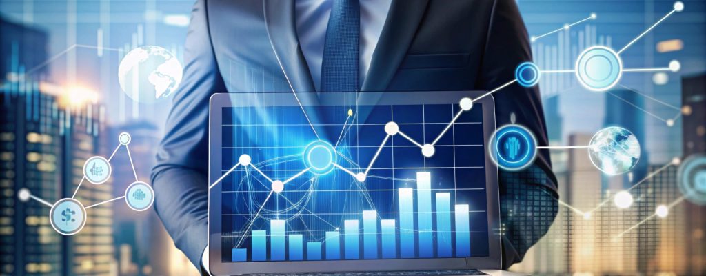 Businessman Holding Laptop Showing Financial Data.